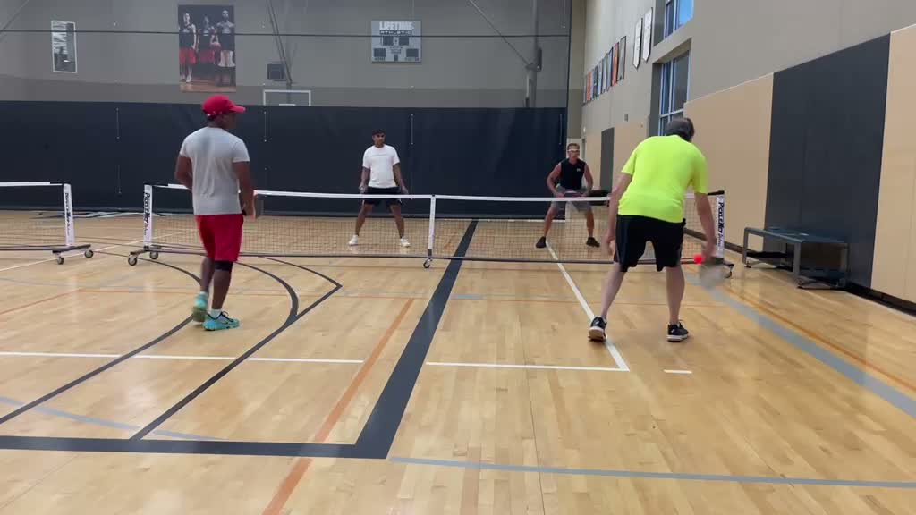 Coach Sam playing pickleball